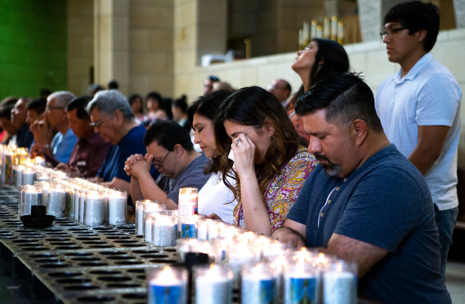 Worshipers pray before a July 1 Mass at the Basilica of Our Lady of San Juan del Valle in San Juan, Texas. A delegation of U.S. bishops concelebrated the Mass at the beginning of their fact-finding mission about Central American immigrant detention at the U.S.-Mexican border.